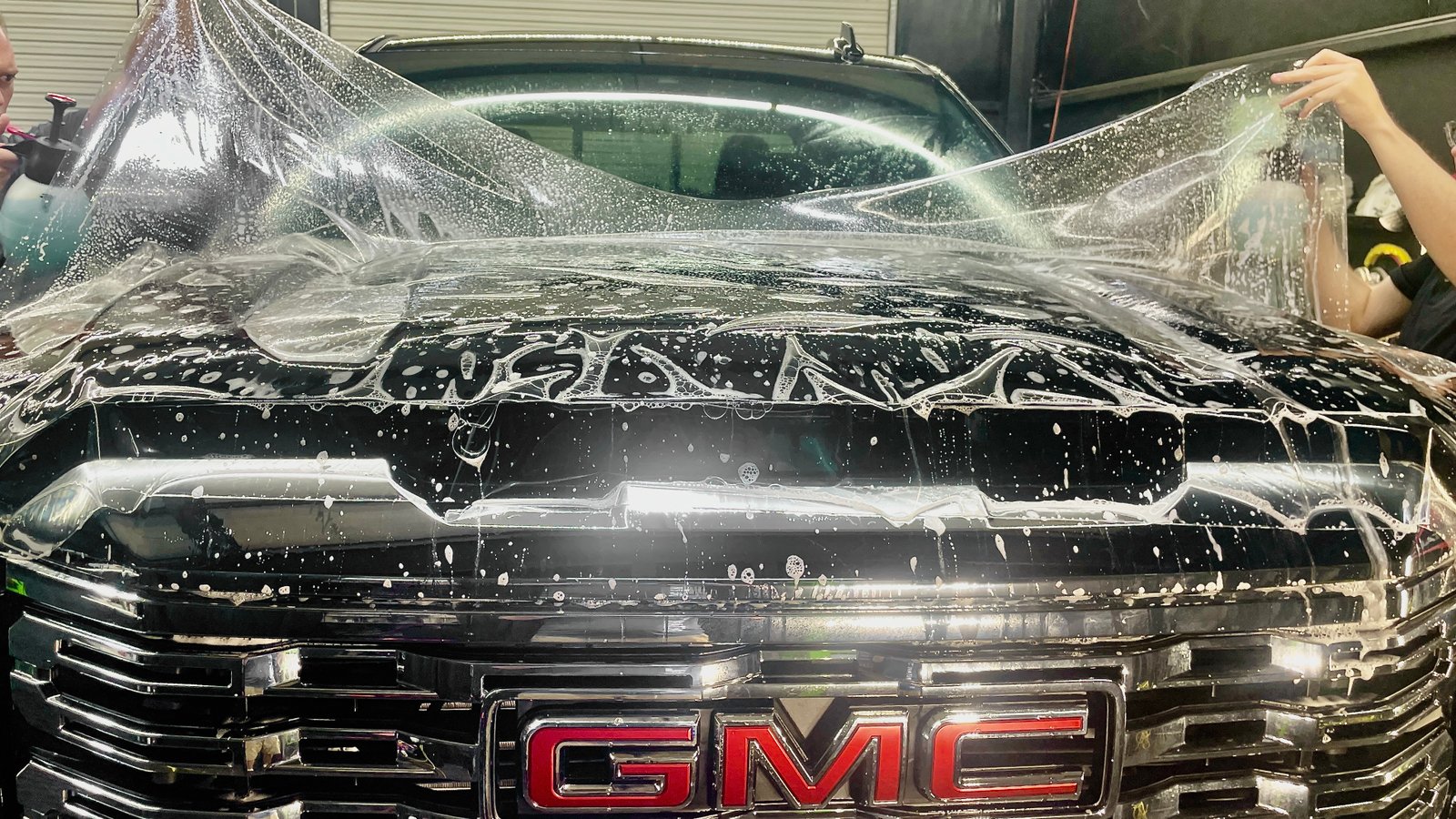 Pickup truck with heavy-duty PPF protection on front bumper